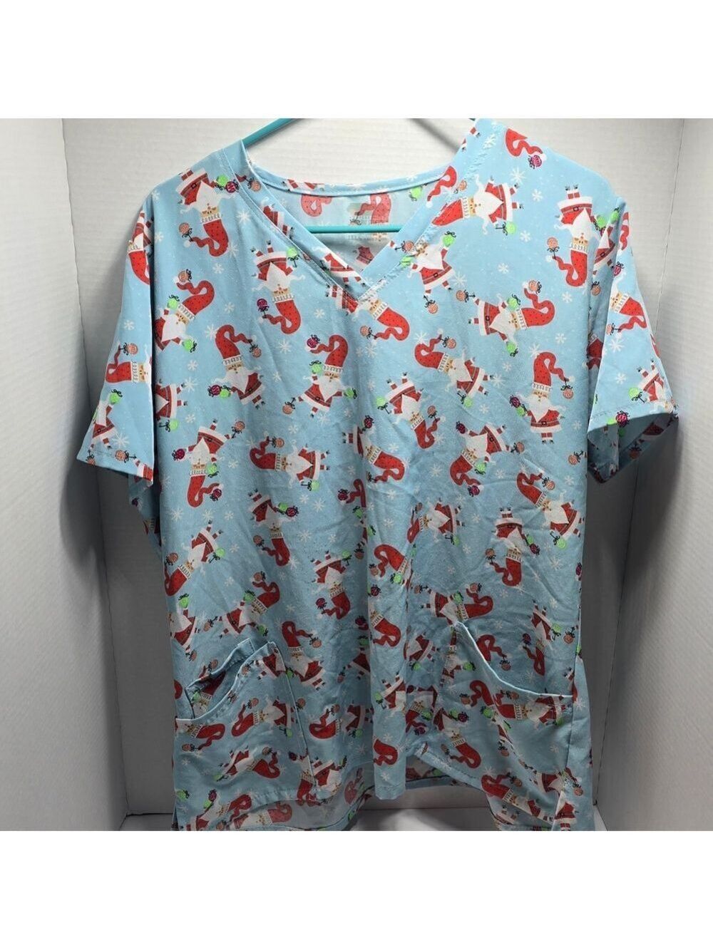 Festive Blue Santa Print Women's Scrub Top